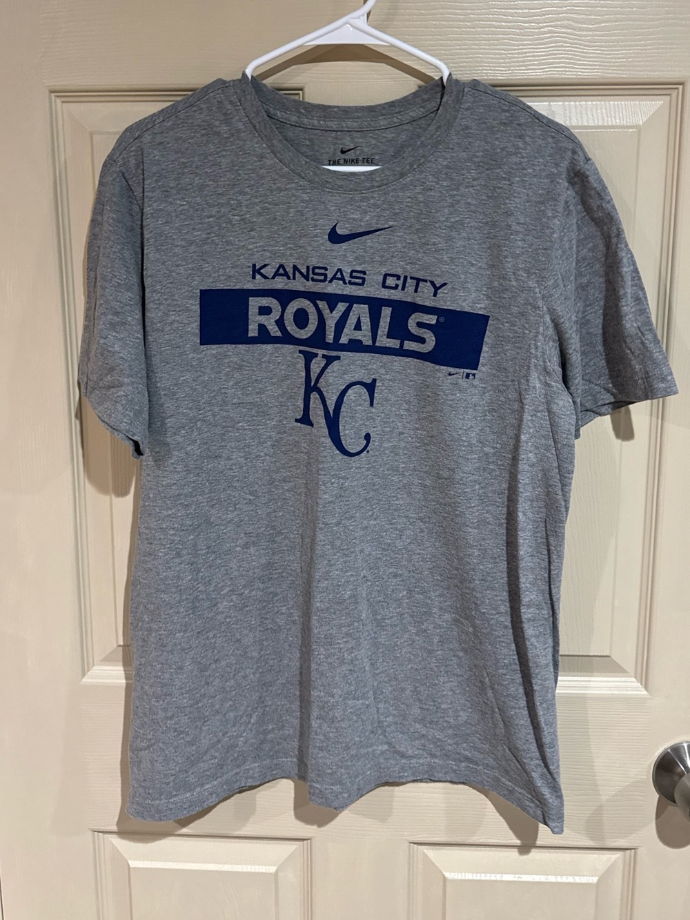The Nike Tee Gray Kansas City Royals Short Sleeve Tee with Blue Logo